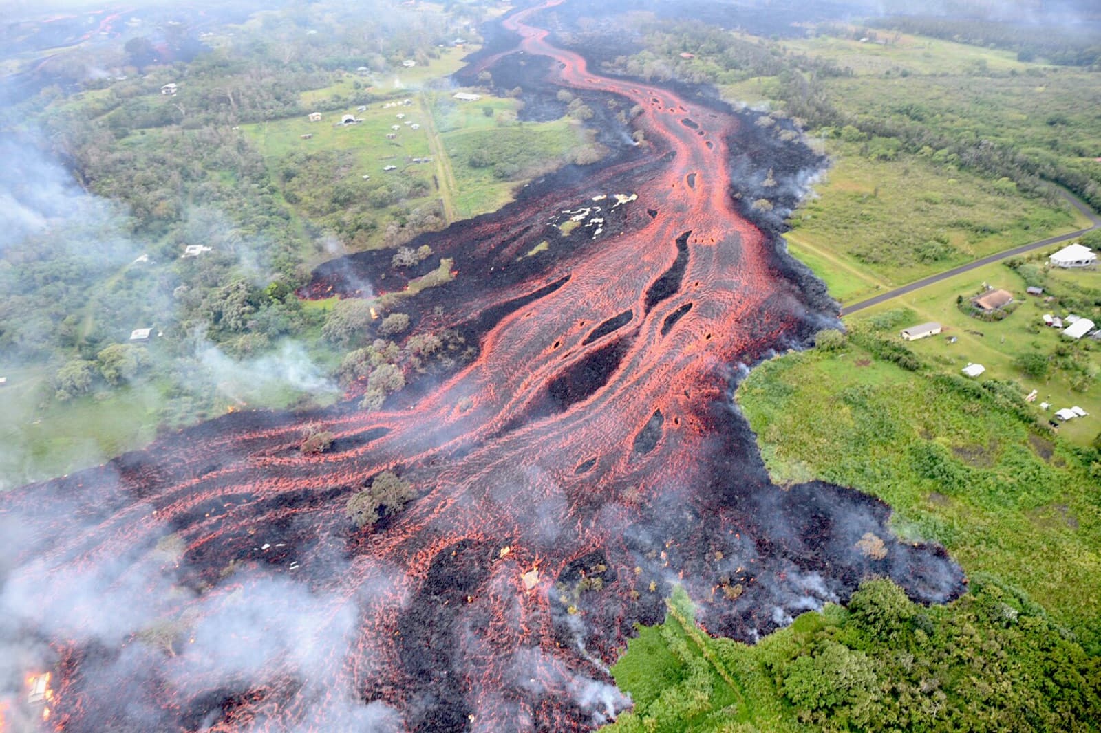 ʻAʻā lava flowing from a fissure during the 2018 lower Puna eruption of Kīlauea on Hawaiʻi Island